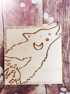 Plaquette carrée en bois Loup et étoiles