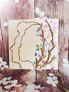 Plaquette carrée en bois Silhouettes et branches fleuries