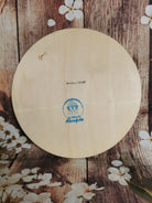 Plaquette ronde en bois pyrogravée Chien & Papillon